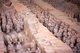 During a drought in 1974, farmers digging a well stumbled across one of the most amazing archaeological finds in modern history - the terracotta warriors.<br/><br/>

The terracotta army, thousands of soldiers, horses and chariots, had remained secretly on duty for some 2,000 years, guarding the nearby mausoleum of Qin Shu Huang / Qin Shi Huangdi, the first emperor of a unified China (r. 246 - 221 BCE). The infamous Qinshi is best known for his ruthless destruction of books and the slaughter of his enemies.<br/><br/>

Each of the terracotta figures, some standing, some on horseback, and some kneeling, bows drawn, is unique, with a different hairstyle and facial expression.